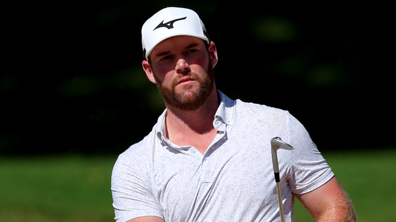 Grayson Murray wearing white hat