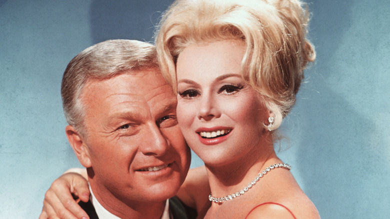 Eddie Albert posing with Eva Gabor