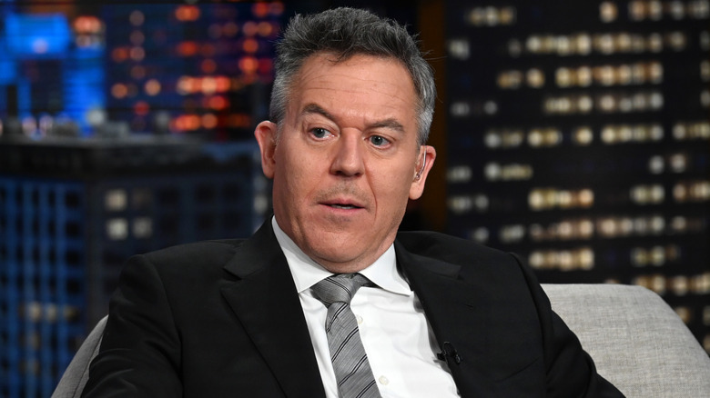 Greg Gutfeld frowning while hosting 