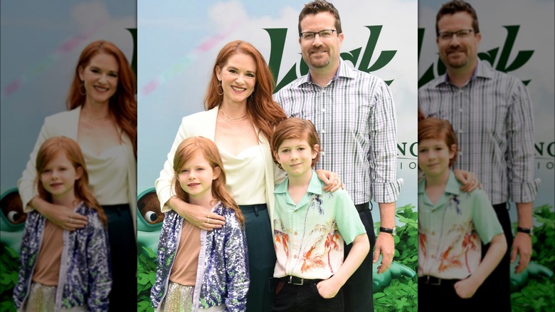 Sarah Drew posing with family