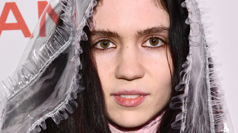 Grimes wearing a veil