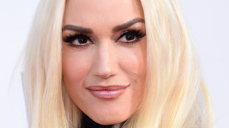 Gwen Stefani smiling in blonde