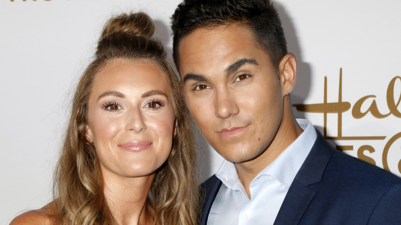 Alexa and Carlos PenaVega posing