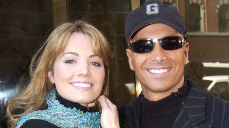 Erica Durance and David Palffy posing for cameras
