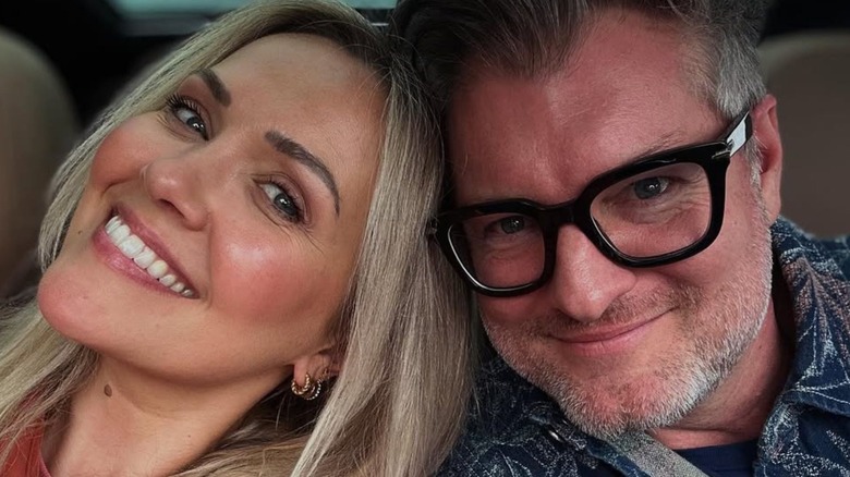 Emilie Ullerup and Kyle Cassie smiling in a car selfie