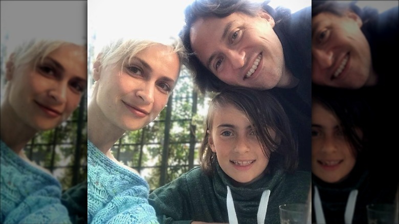 Halyna and Matthew Hutchins with their son