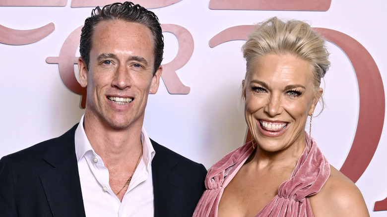 Hannah Waddingham wearing a pink velvet dress and smiling next to ﻿Nick Beresford-Cleary in June 2026