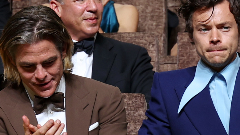 Chris Pine and Harry Styles sit at the Venice Film Festival