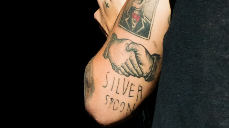 Close up of Harry Styles' tattoos