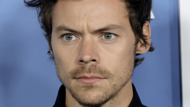Harry Styles frowning
