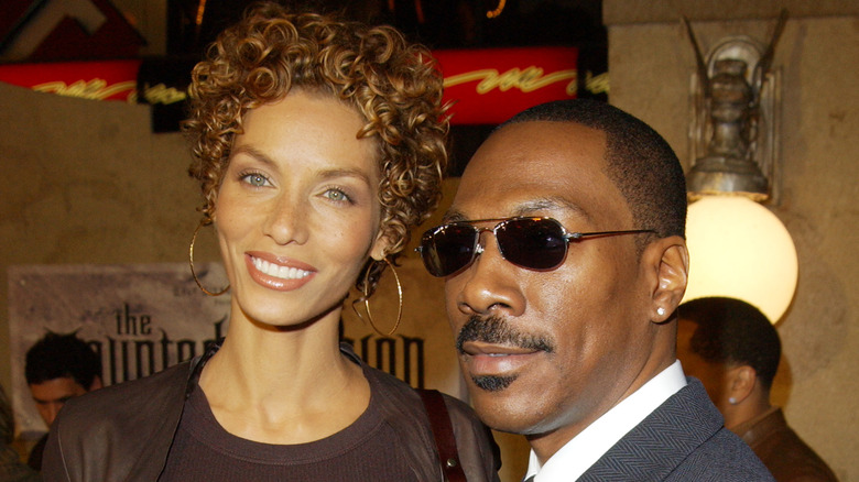 Nicole Murphy and Eddie Murphy smiling