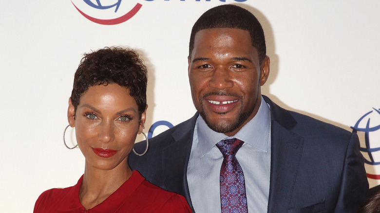 Nicole Murphy and Michael Strahan