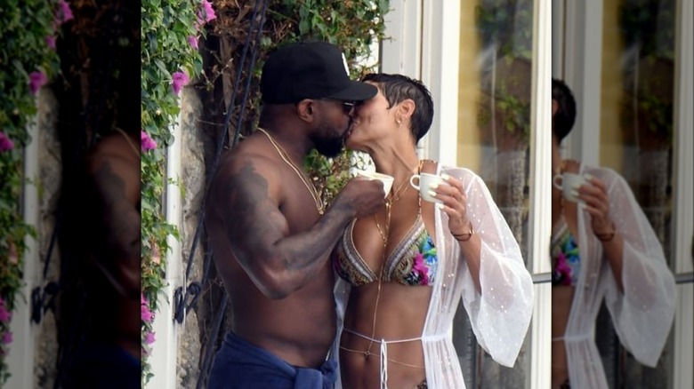 Antoine Fuqua kissing Nicole Murphy 