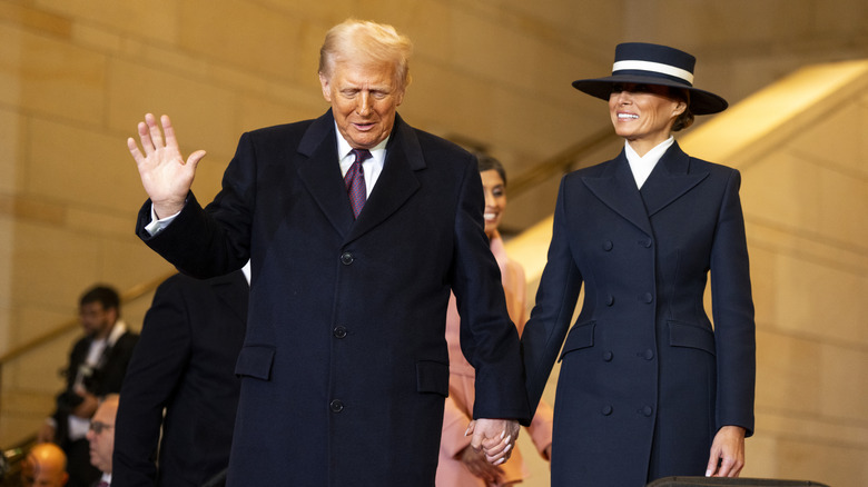 Donald Trump and Melania Trump sporting her 2025 her inauguration day hat