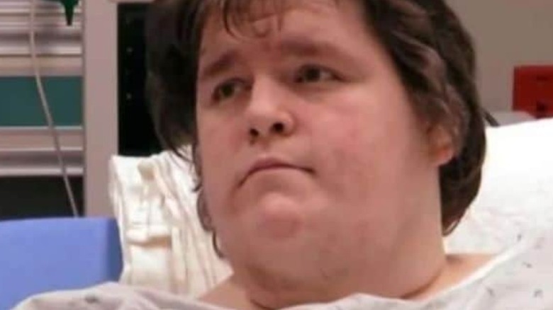 Sean Milliken in a hospital bed