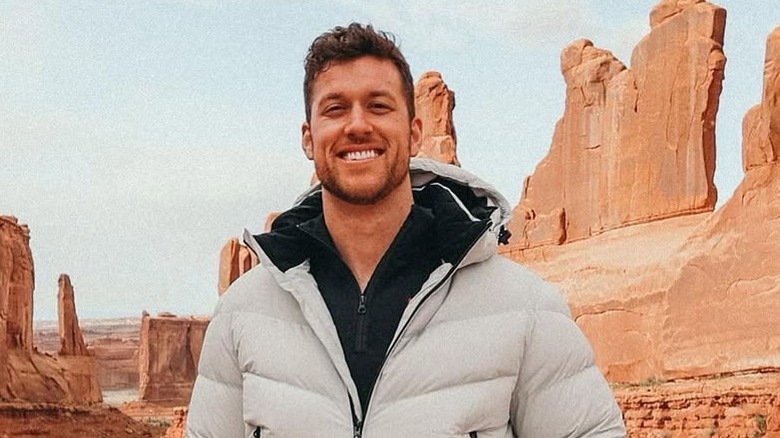 Clayton Echard posing for cameras on vacation