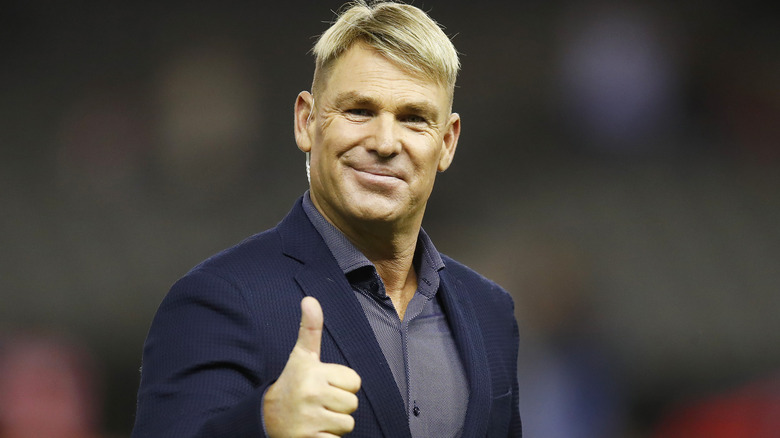 Shane Warne giving a thumbs-up