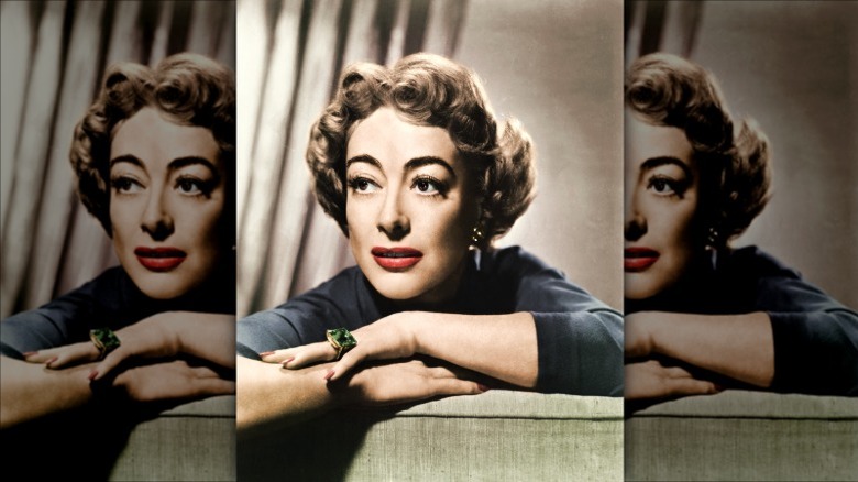 Joan Crawford posing for a photo