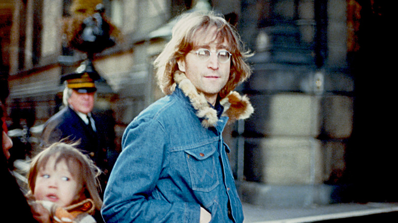 John Lennon poses for a photo with his wife Yoko Ono and son Sean Lennon in 1977