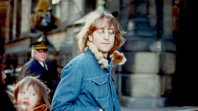 John Lennon poses for a photo with his wife Yoko Ono and son Sean Lennon in 1977