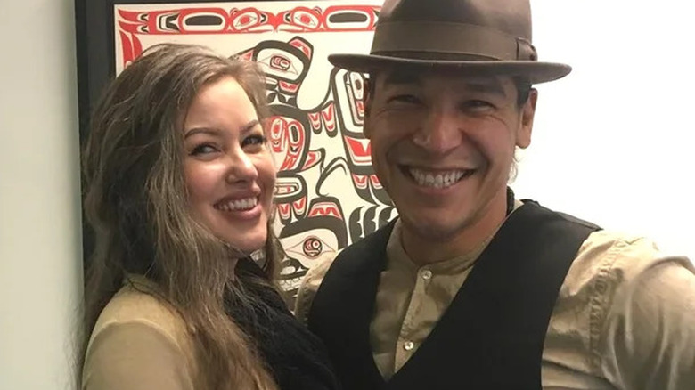 Jolene and Nathaniel Arcand posing for cameras