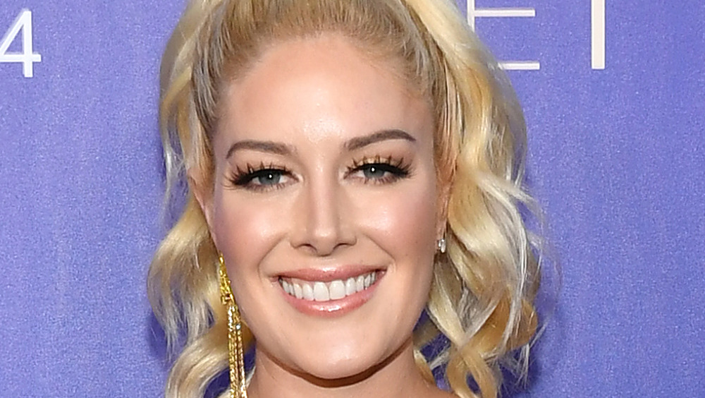 Heidi Montag smiling on the red carpet 