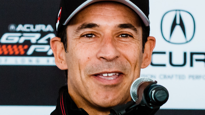 Helio Castroneves speaking at an event