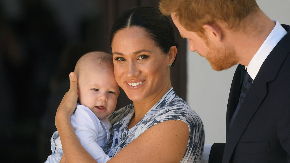 Meghan Markle holds baby Archie