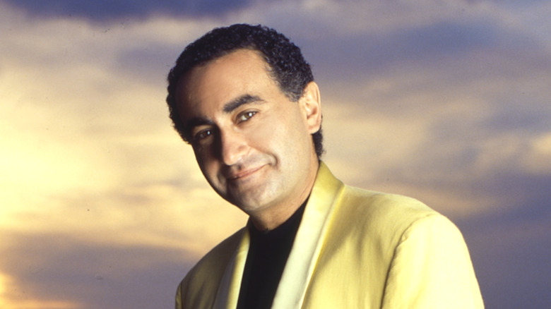 Dodi Fayed smiling yellow jacket
