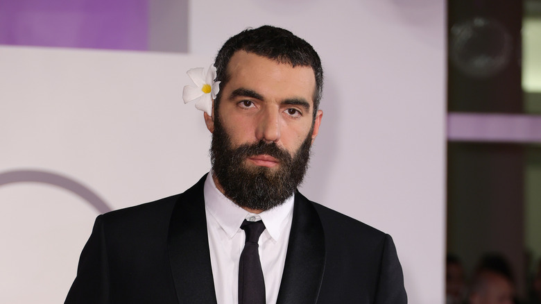Romain Gavras with a flower on his ear