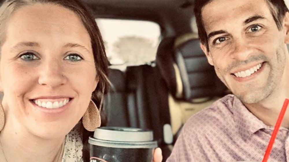 Jill Duggar Dillard and Derick Dillard driving in 2020