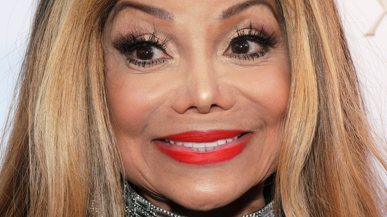 La Toya Jackson smiles