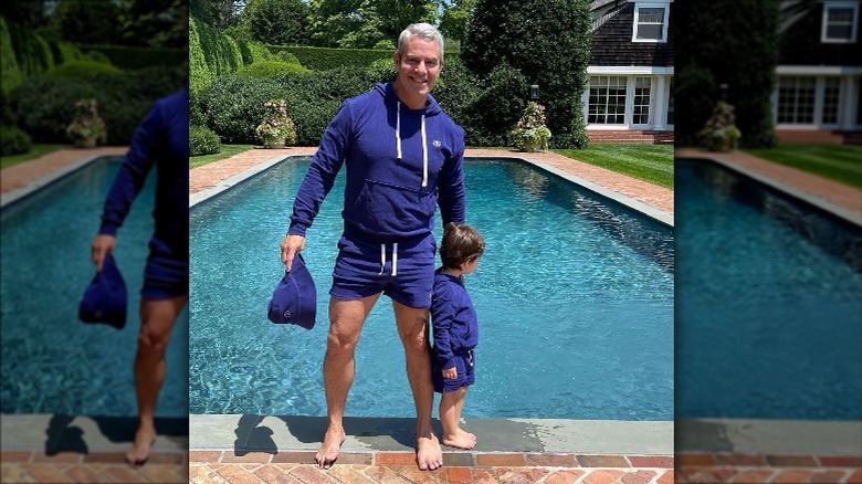 Andy Cohen and his son by the pool