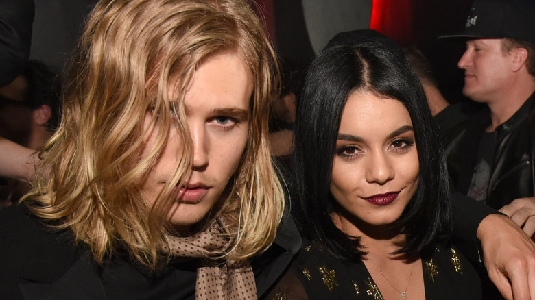 Austin Butler with long hair, Vanessa Hudgens smiling
