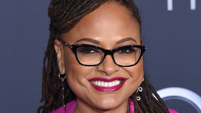 Ava DuVernay smiling in glasses