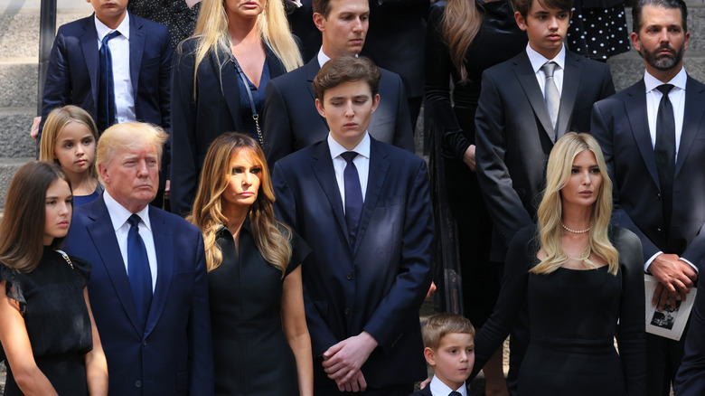Barron Trump with family