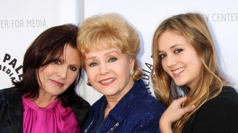 Carrie Fisher, Debbie Reynolds and Billie Lourd smiling