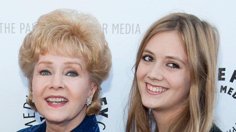 Debbie Reynolds and Billie Lourd grinning