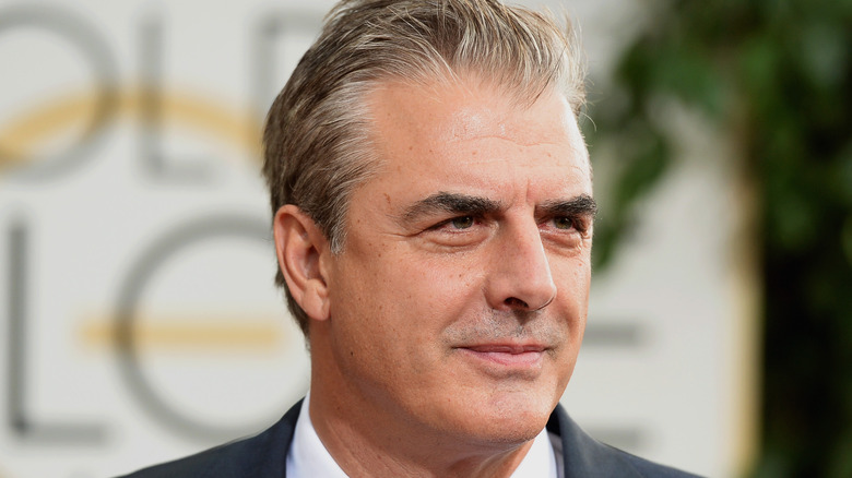 Chris Noth smirking