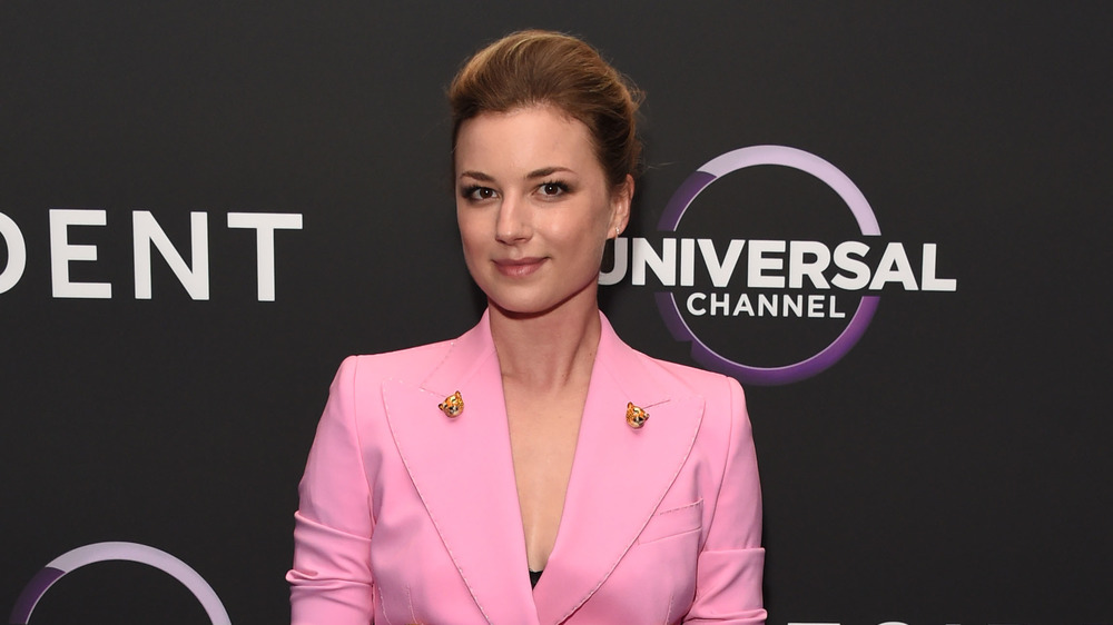 Emily VanCamp wearing a pink blazer