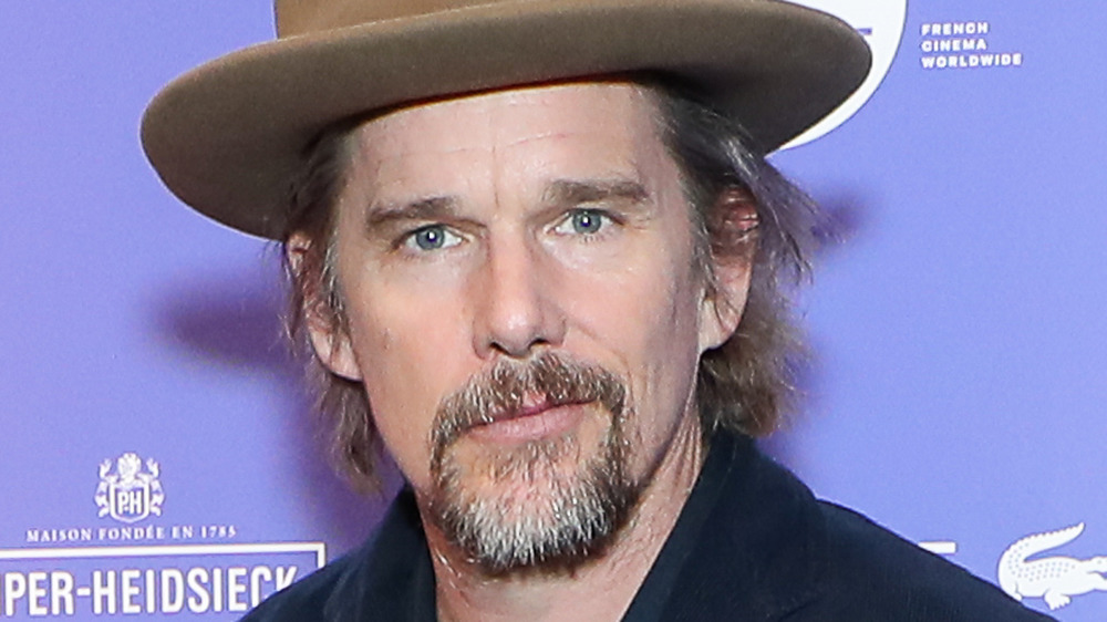 Ethan Hawke wearing hat