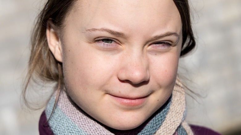 Greta Thunberg grinning
