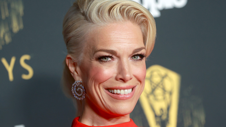 Hannah Waddingham wearing swirl-shaped earrings