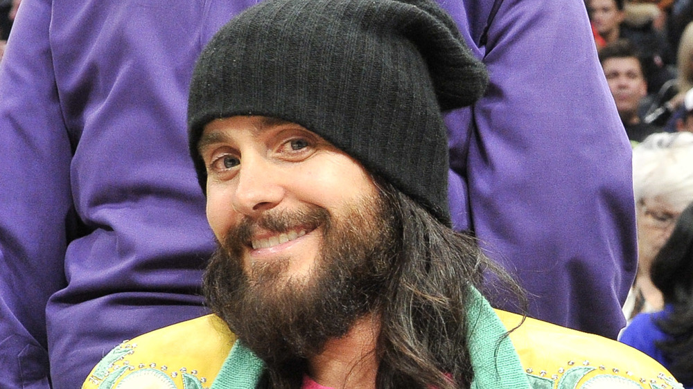 Jared Leto sitting court side