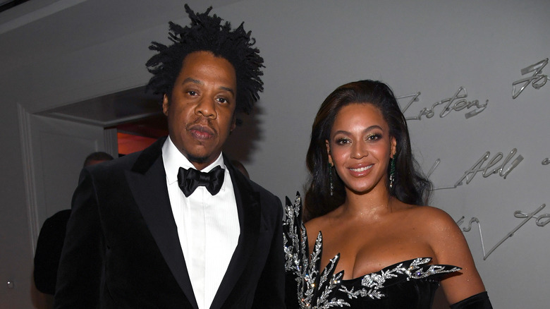 Jay-Z short dreadlocks Beyonce long straight hair