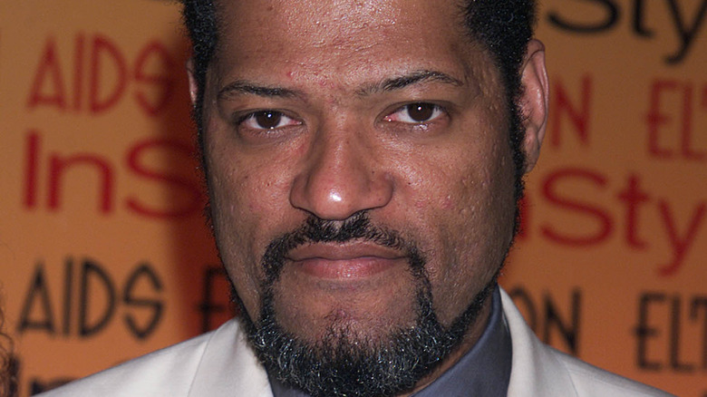 Laurence Fishburne with a salt-and-pepper goatee 