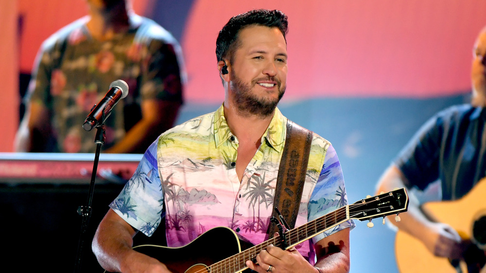 Luke Bryan playing guitar