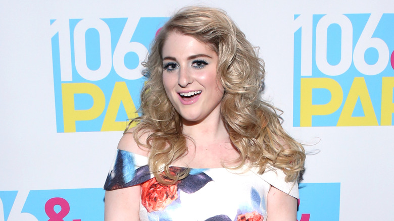 Meghan Trainor smiling on the red carpet
