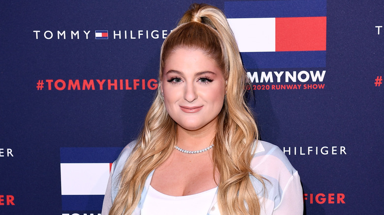 Meghan Trainor smiling on the red carpet