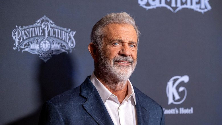 Mel Gibson smiling at red carpet event